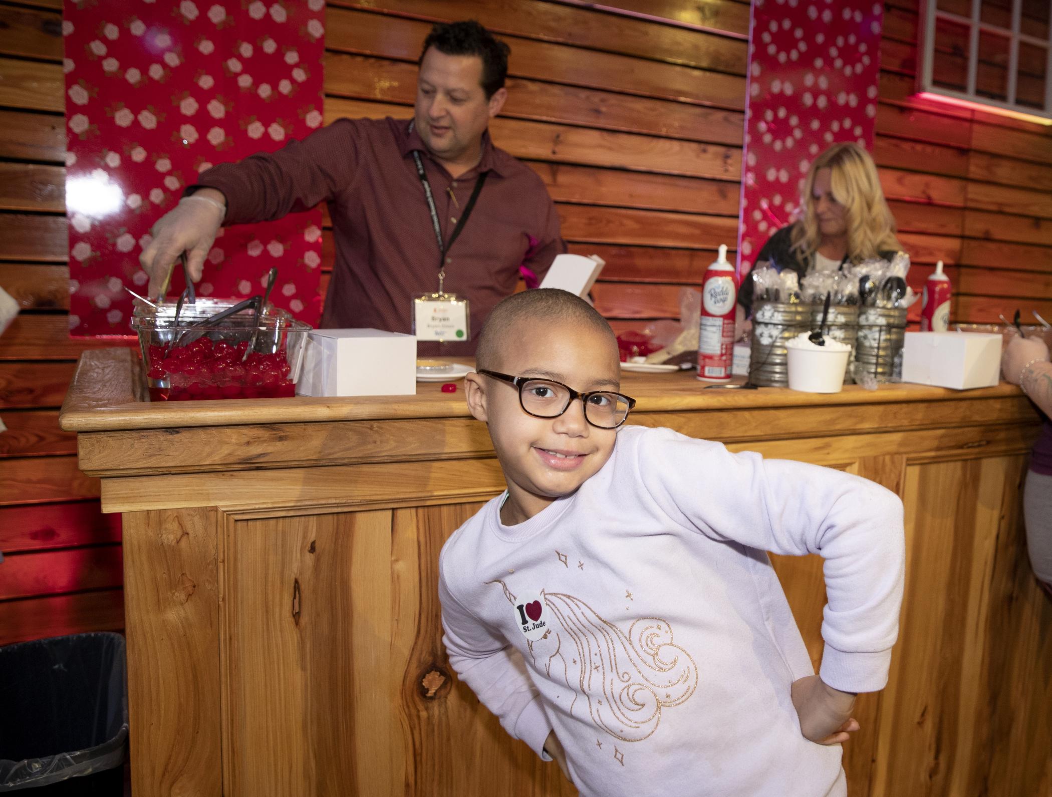 Making ice cream sundaes for children