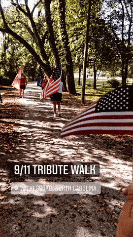 A moving image of an American flag during the 9-11 Moving Tribute A moving image of an American flag during the 9-11 Moving Tribute