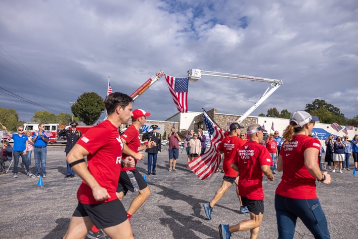 Old Glory Relay runners bring the American flag to Window World's corporate office