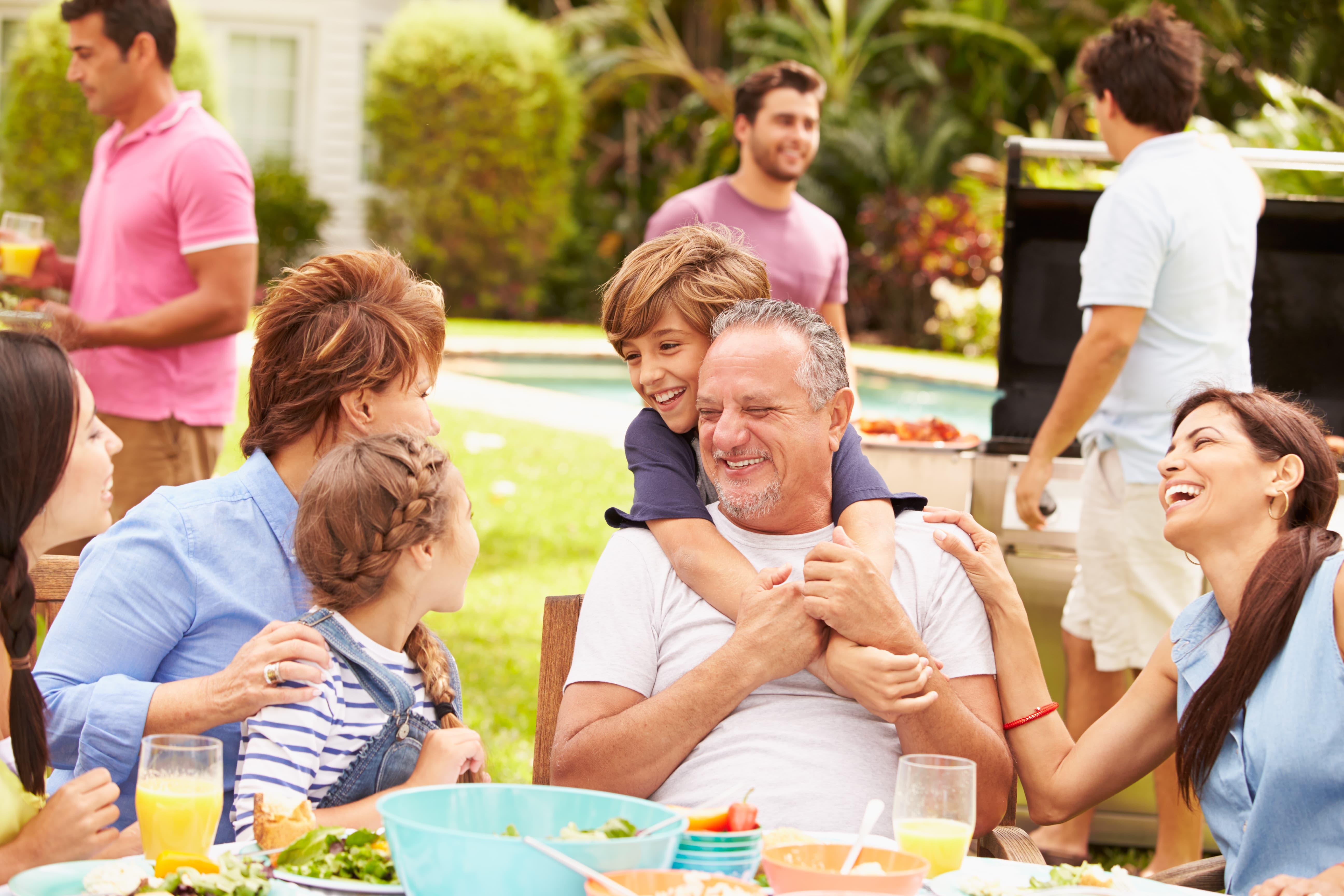 Family Enjoying Summer Backyard Party Window World Hero 1920X1280