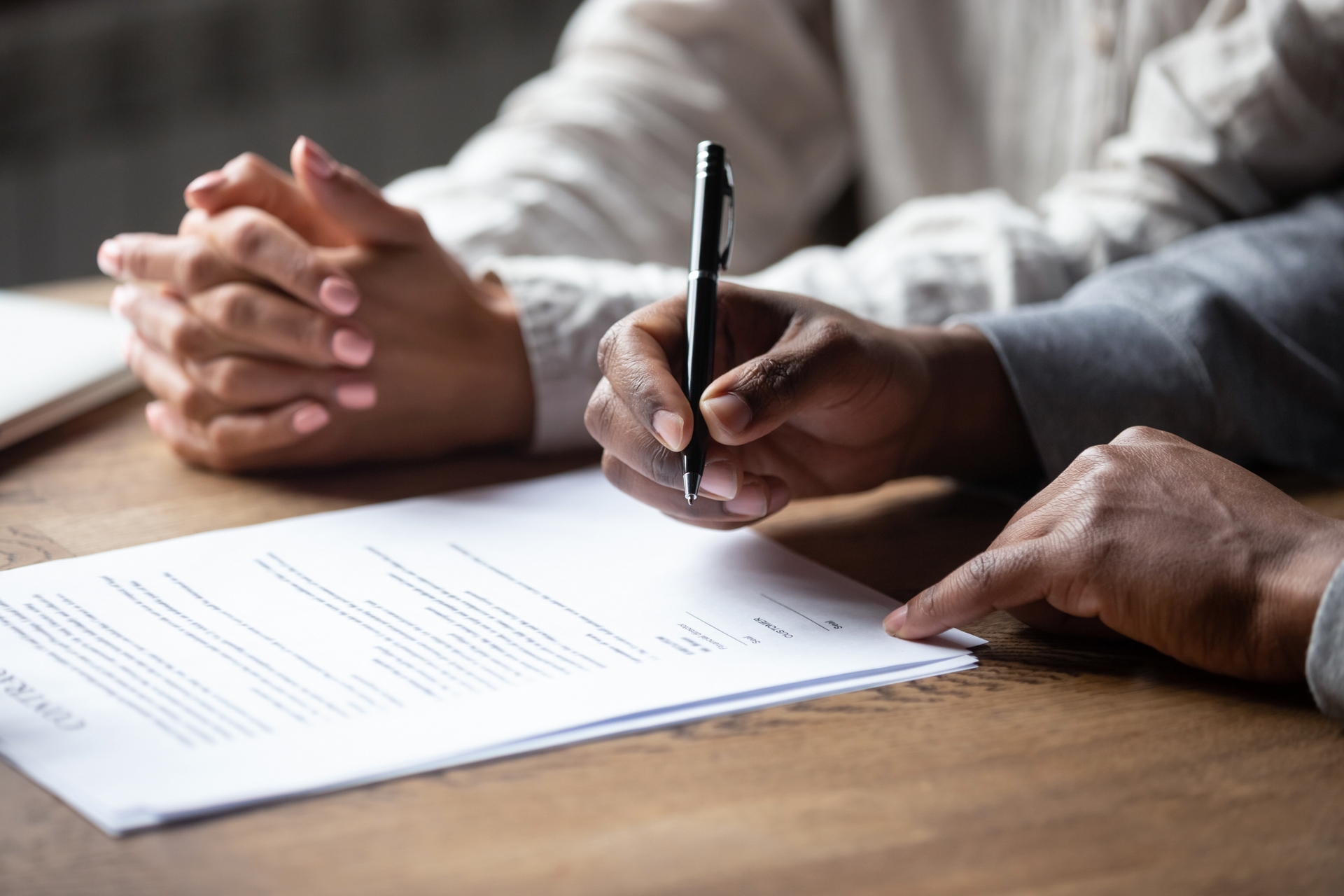 Header Couple Signing Business Contract Together