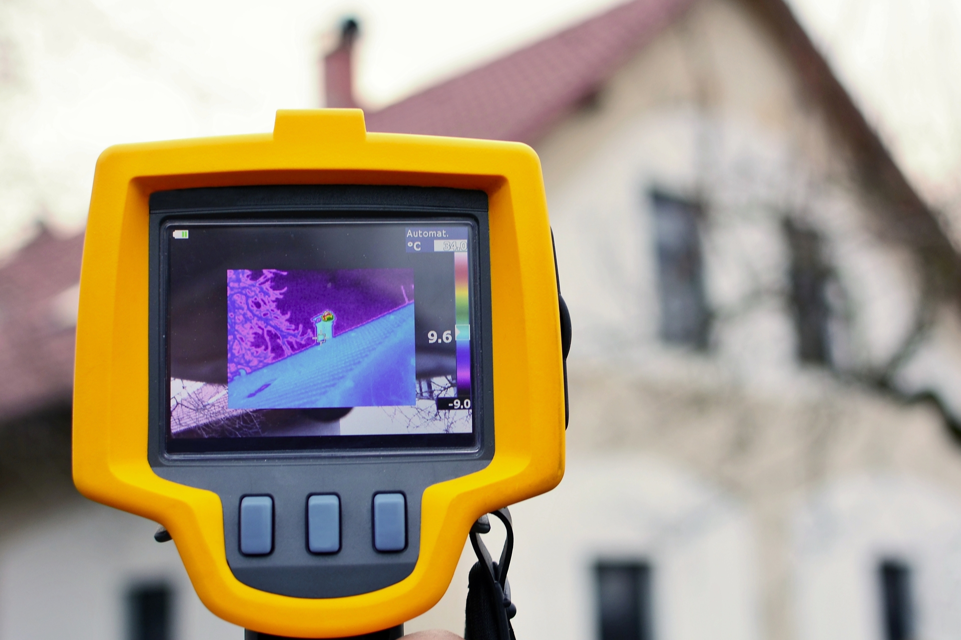 Header Recording Heat Loss Of The Roof On The House With Infrared Thermal Camera In Hand