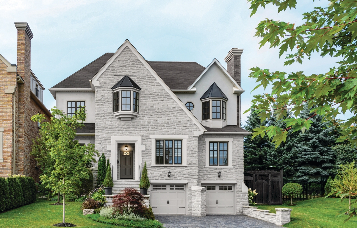 Curb view of an attractive two-story house Curb view of an attractive two-story house