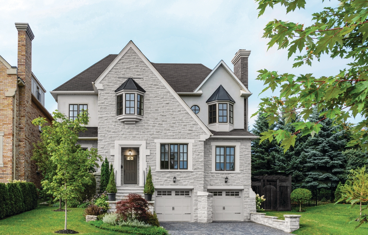 Curb view of an attractive two-story house