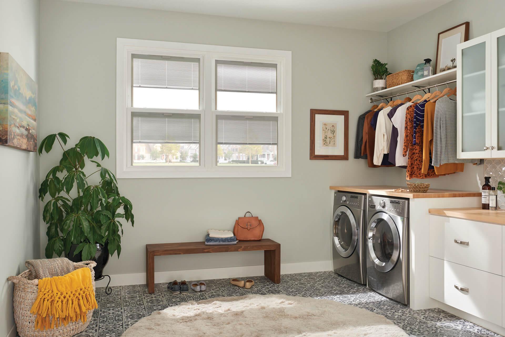 Modern mudroom laundry room design with energy-efficient windows
