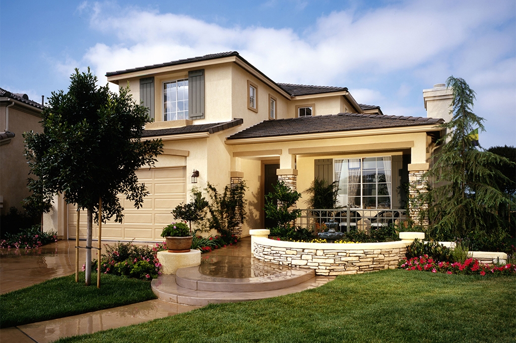 Stucco house with Spanish style roof