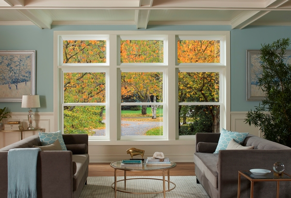 View through living room windows in fall