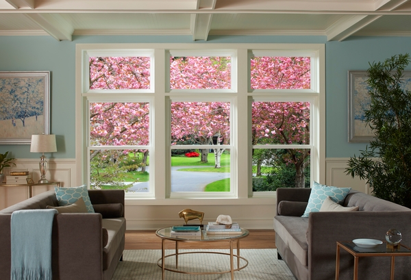 View through living room windows in spring View through living room windows in spring