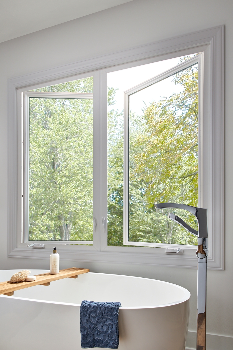 Open casement windows in a bathroom