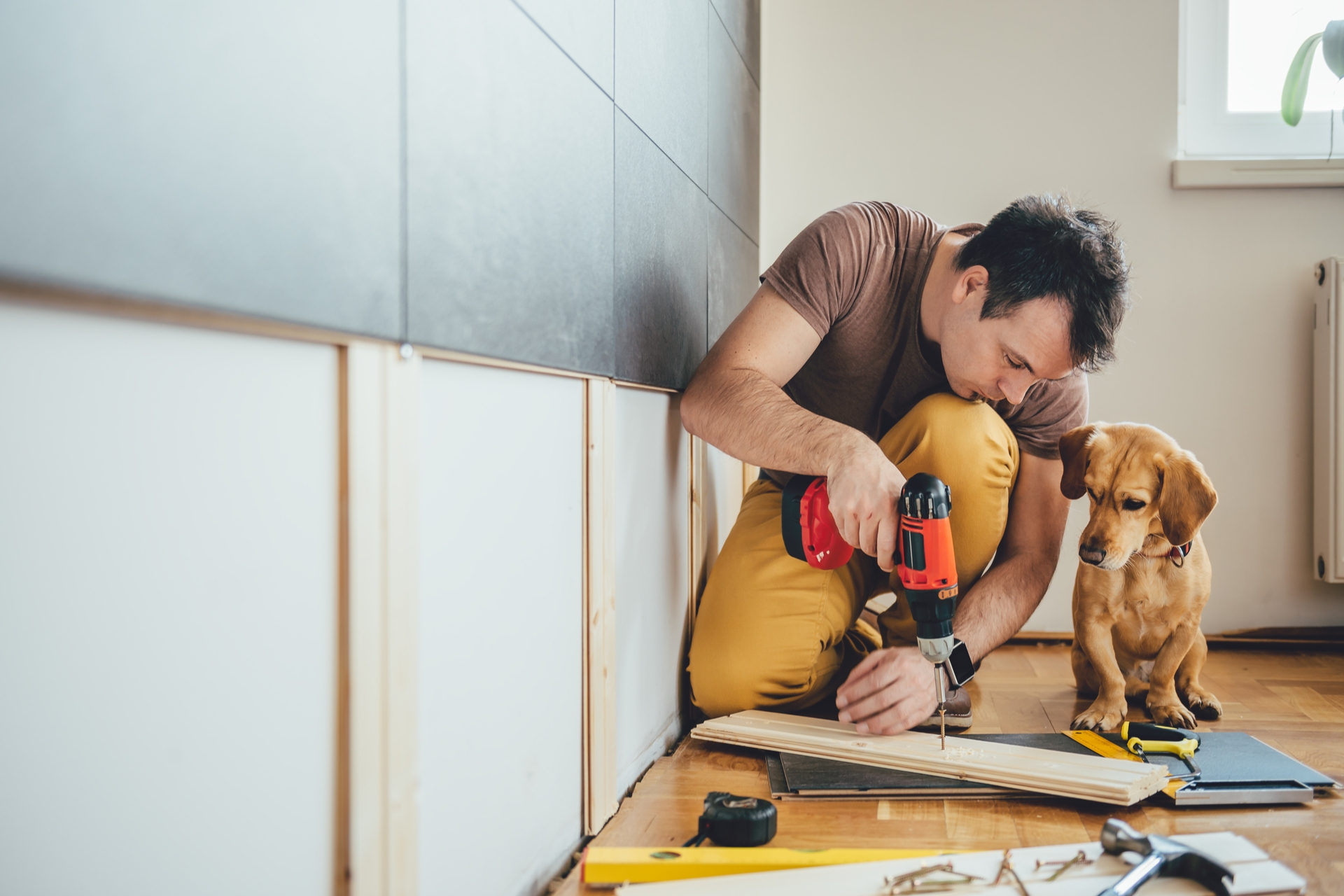 Man Doing Diy Renovation In His Home