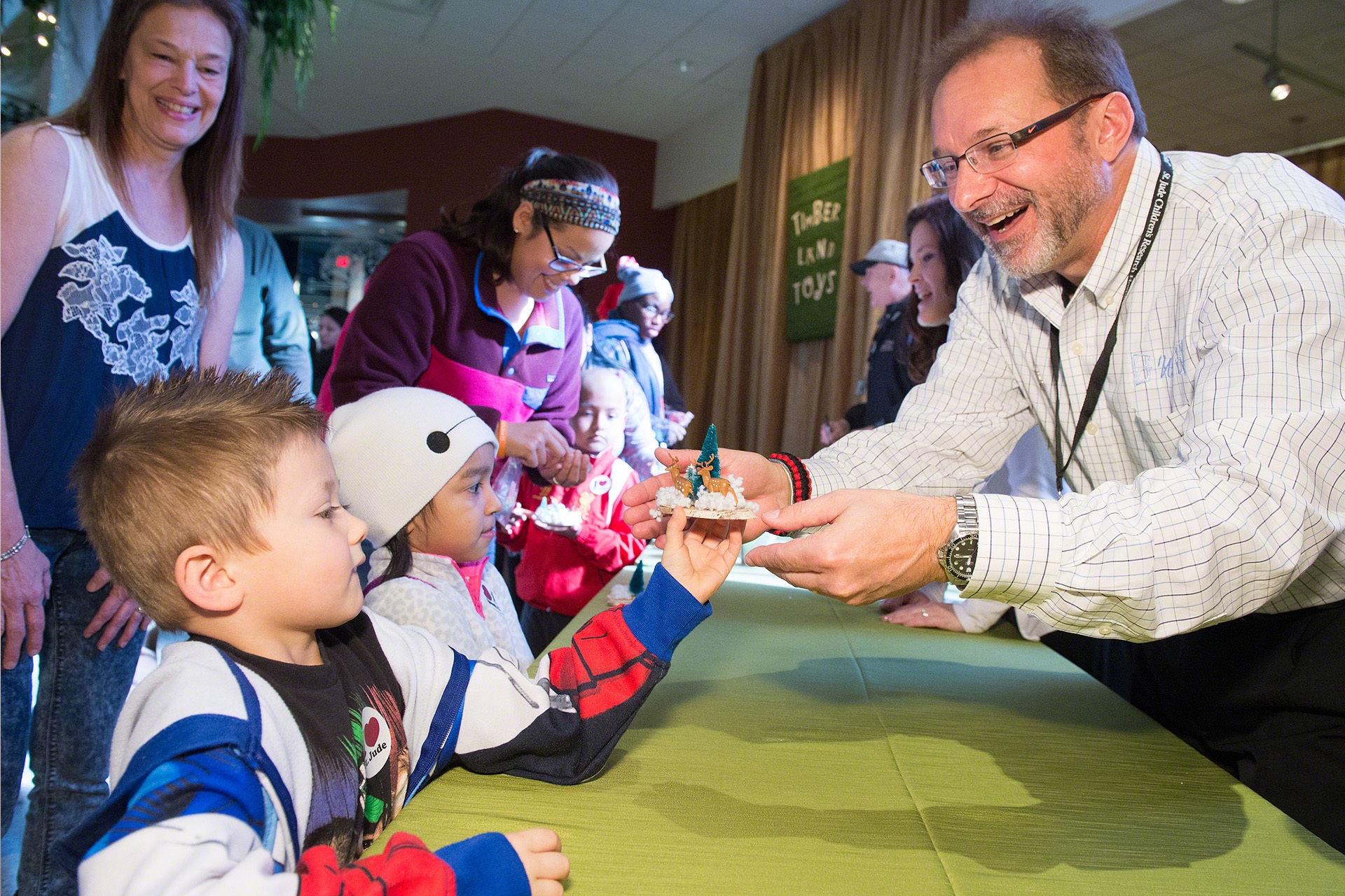 Window World employee gives gift to child at St. Jude