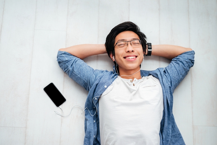 Man listening to music at home