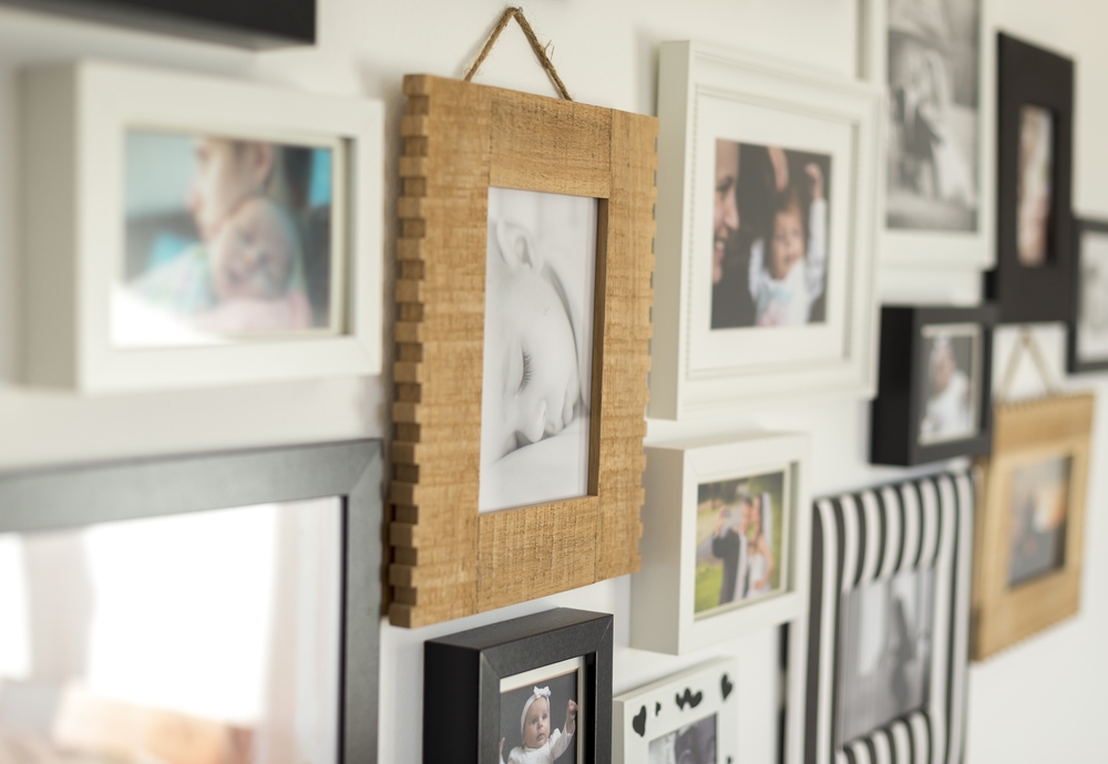 Family pictures hanging on a wall