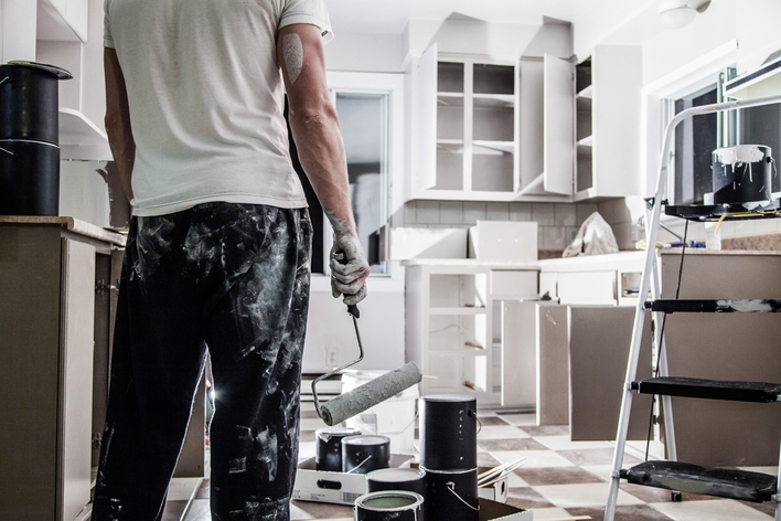 Man painting a kitchen 