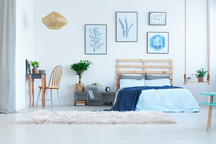 Light colored walls in a bedroom