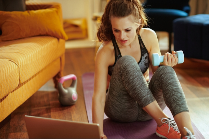 Woman exercising from home