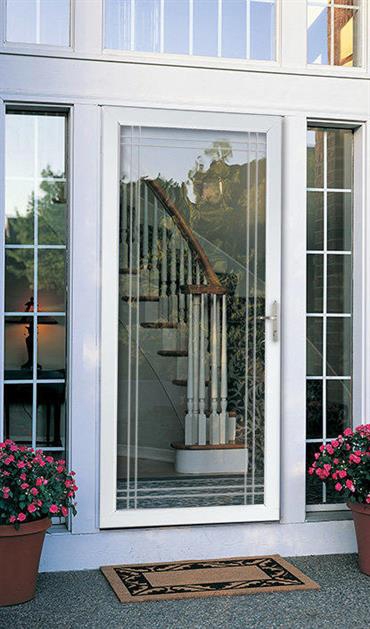 white full view storm door with decorative double bevel glass