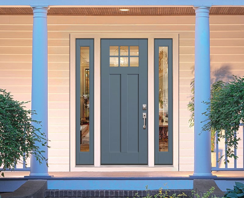 A smooth entry door on a white house.