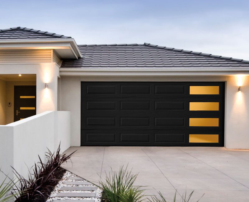 A modern-looking home with an Amarr Lincoln garage door replacement.